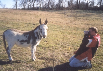 Greg photographs Faith, both being asses.